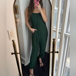 Green Jumpsuit with adjustable straps and pockets, and elastic band bottoms